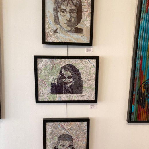 Biro drawings of various icons in a local art gallery